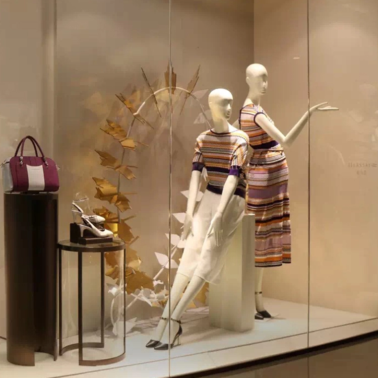 female retail window display design acrylic leaves popular visual props