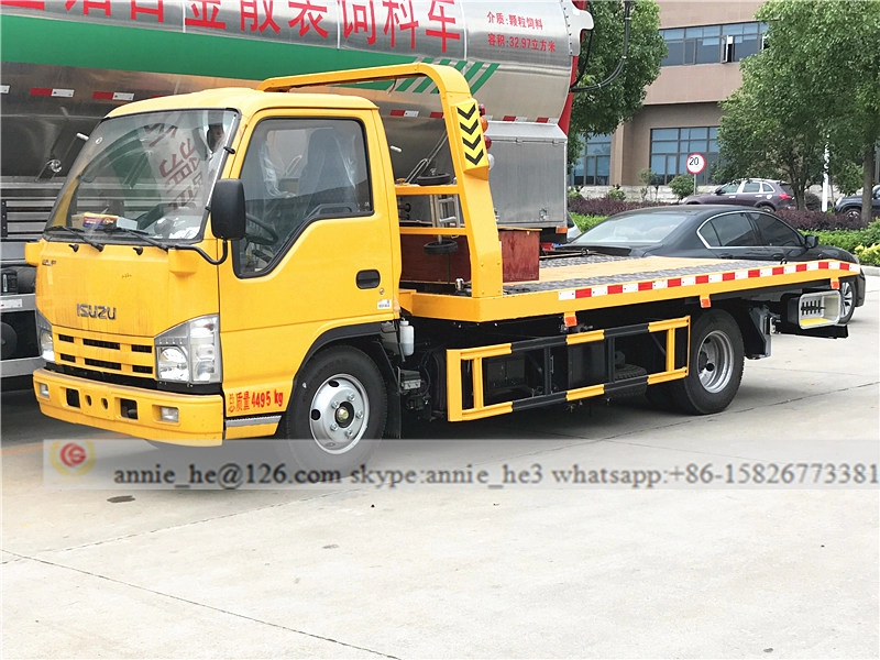 Flatbed tow truck ISUZU 3T