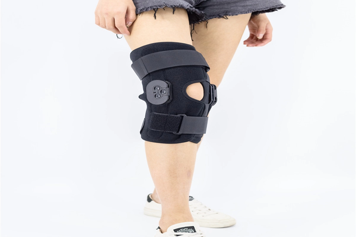 ACL hinged knee wraparound OK cloth laminated breathable neoprene liner with open patellar