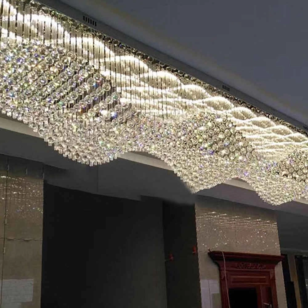 Long wave crystal mounted chandelier