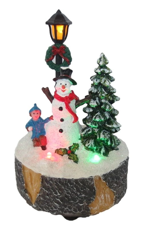 Lighted Up  Christmas Building Snowman, Snowball Fighting And Choirs Village