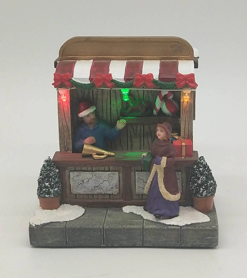 Lighted Up  Christmas Toy Shop With Woman