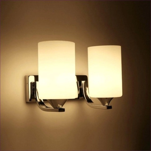 Polished chrome double light wall sconce with cylinder shades