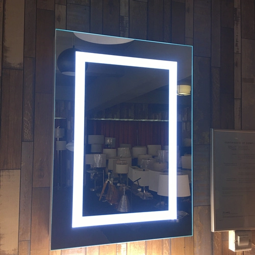 LED illuminated bathroom mirror cabinet with shaver socket