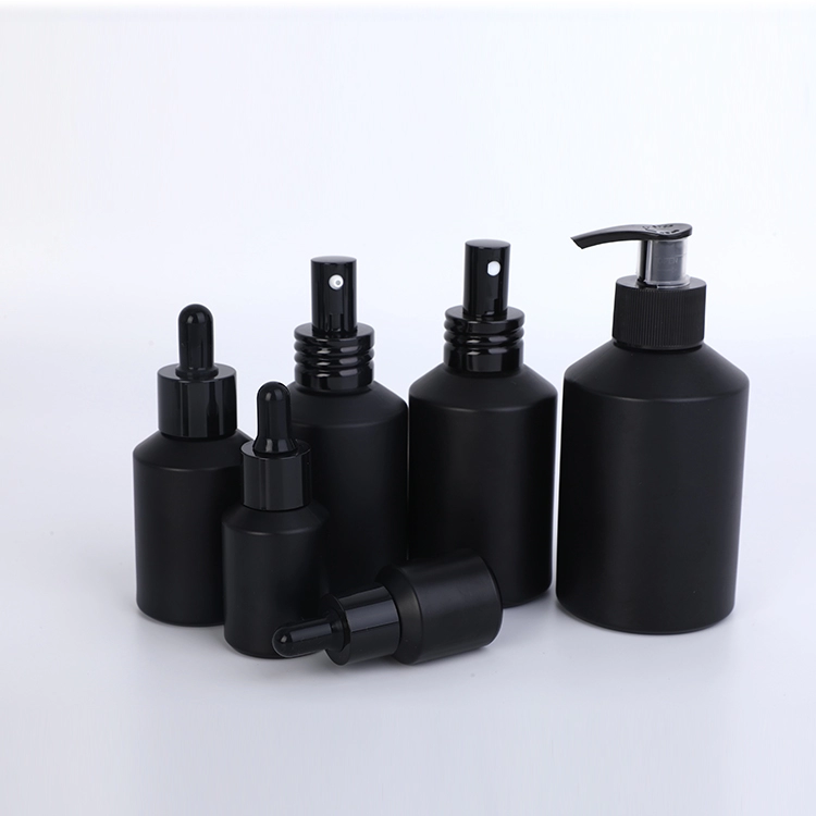 Full set cosmetic frosted black glass bottle