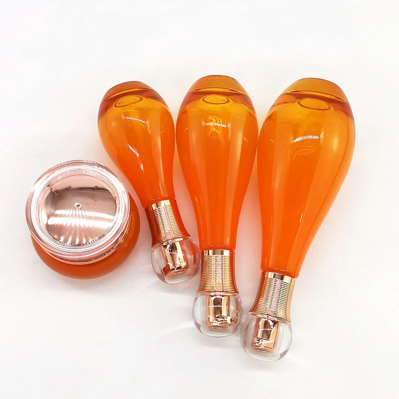 Bowling ball shaped orange glass bottle jar
