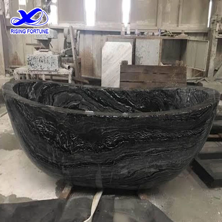 Polished black marble bathtub