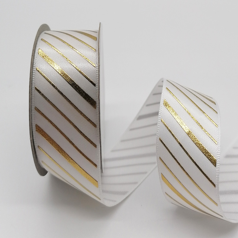 White satin ribbon with gold pattern