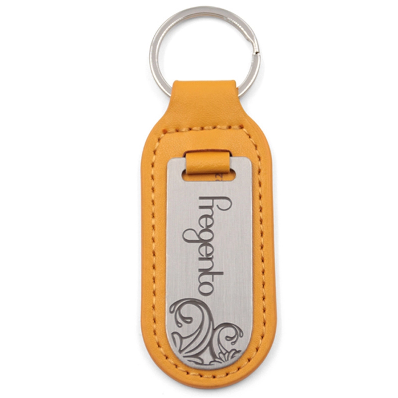 Metal logo yellow leather keychain manufacturer