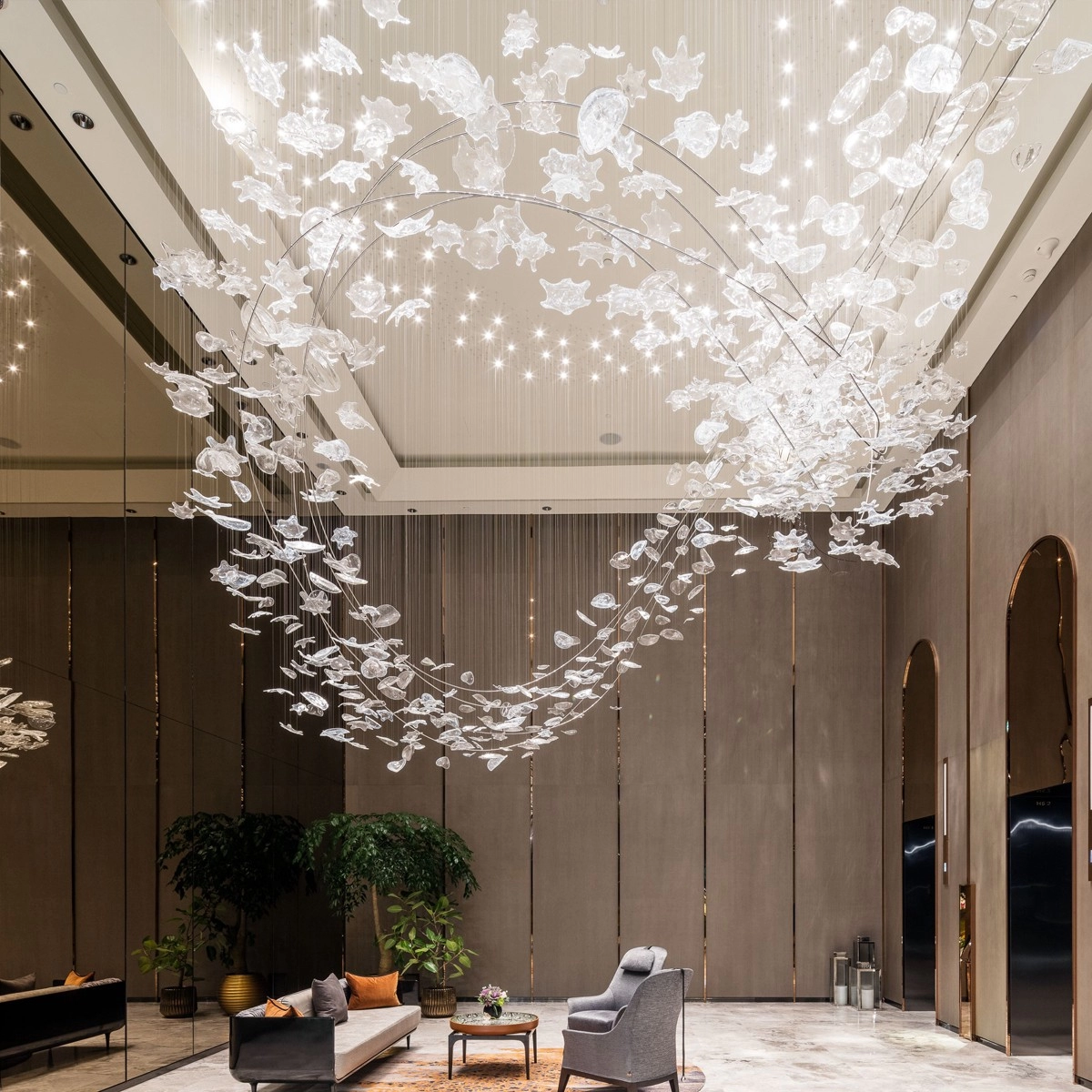 Glass leaves chandelier for large lobby