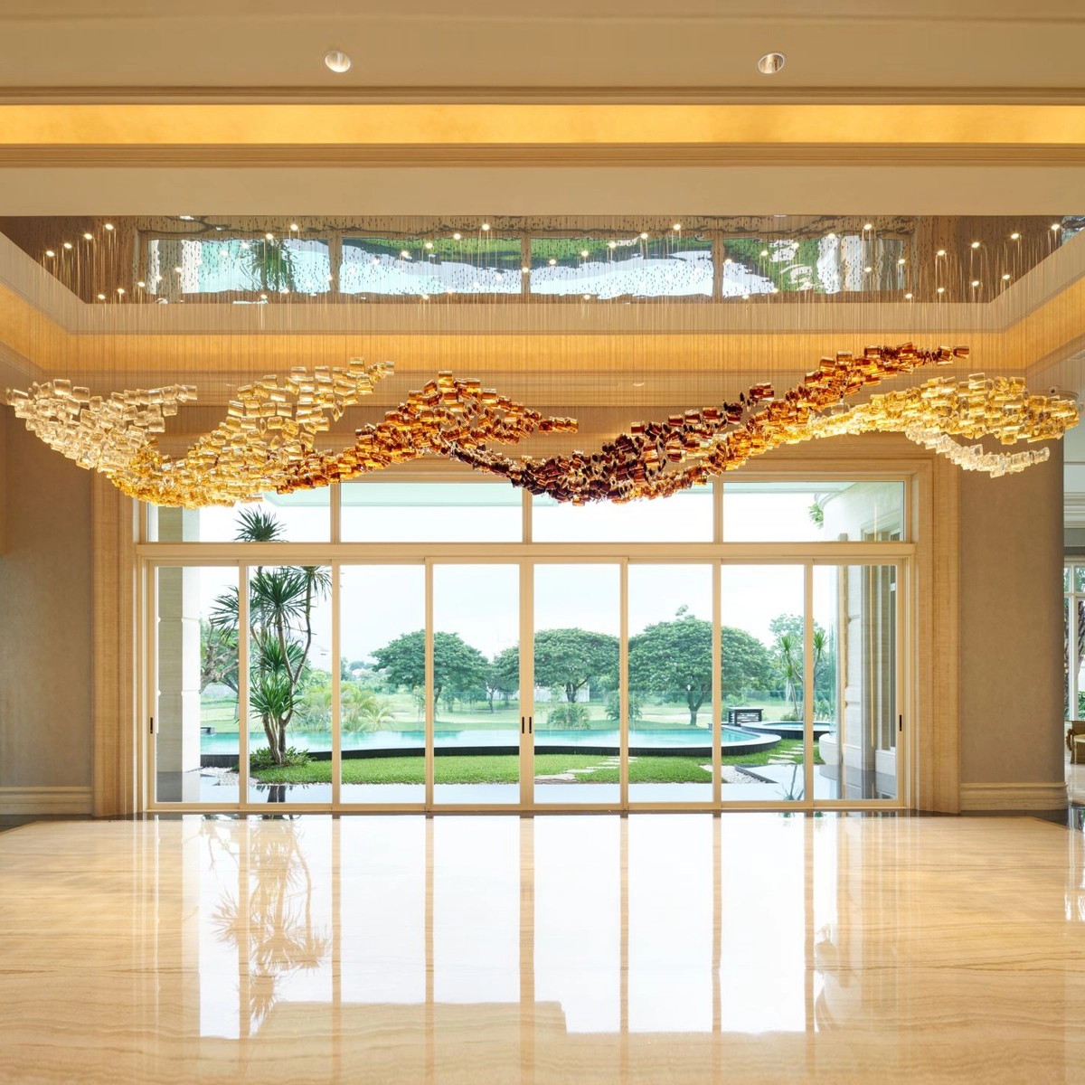 Twisted amber long glass wave chandelier