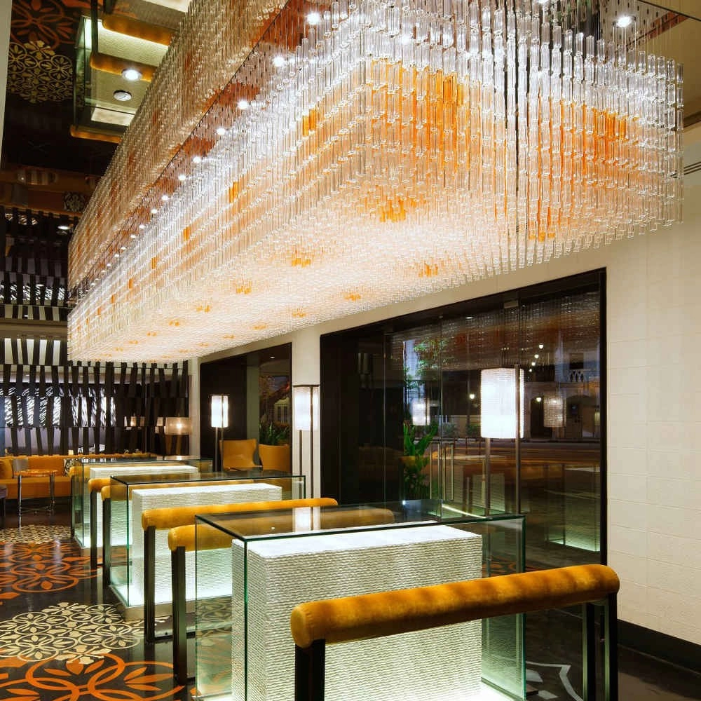 Large Amber glass tube chandelier for hotel lobby