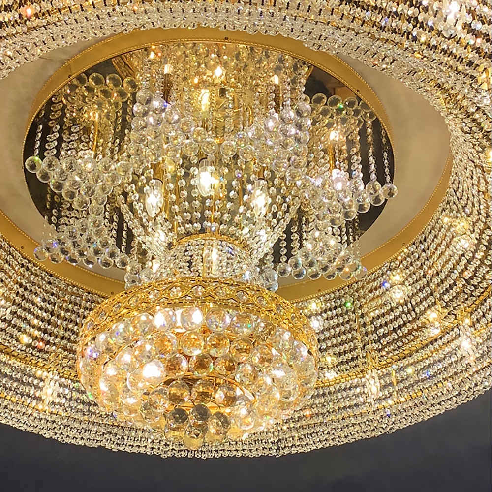 Round empire mounted crystal wrapped rounded chandelier